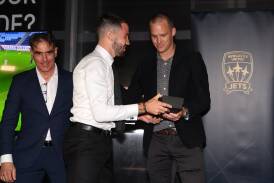 Apostolos Stamatelopoulos (centre) with coach Rob Stanton (left) and former Jets' captain Nigel Boogaard at the awards night on Tuesday. Picture by Peter Lorimer