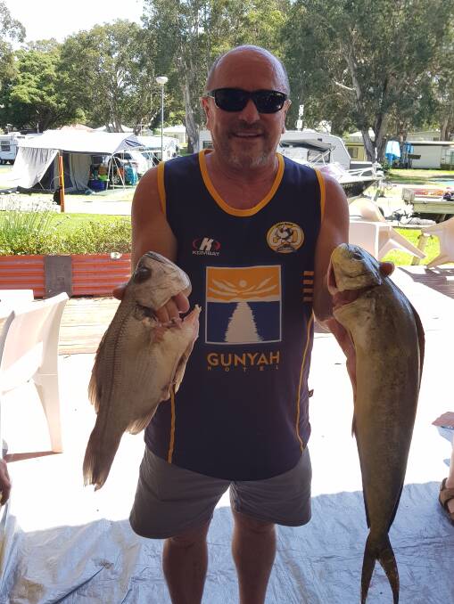 TWICE AS NICE: Jimmy O'Keefe of Caves Beach shared in a catch of pearl perch and dolphin fish.