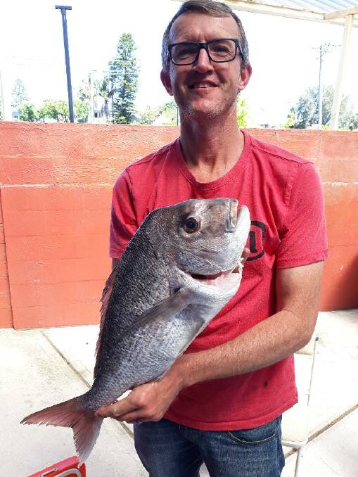 TOP CATCH: Jason Taylor with a 2.5kg red snapper.