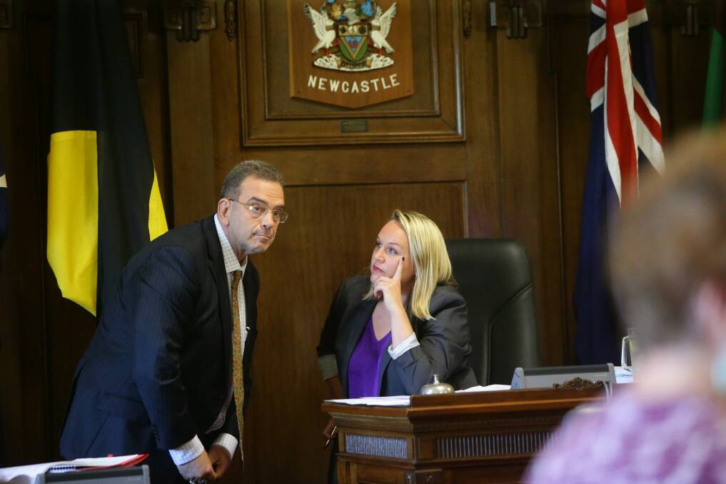SUDDEN EXIT: Former Newcastle Council manager of legal services Frank Giordano with Lord Mayor Nuatali Nelmes. Mr Giordano's surprise resignation has baffled councillors. Picture: Jonathan Carroll