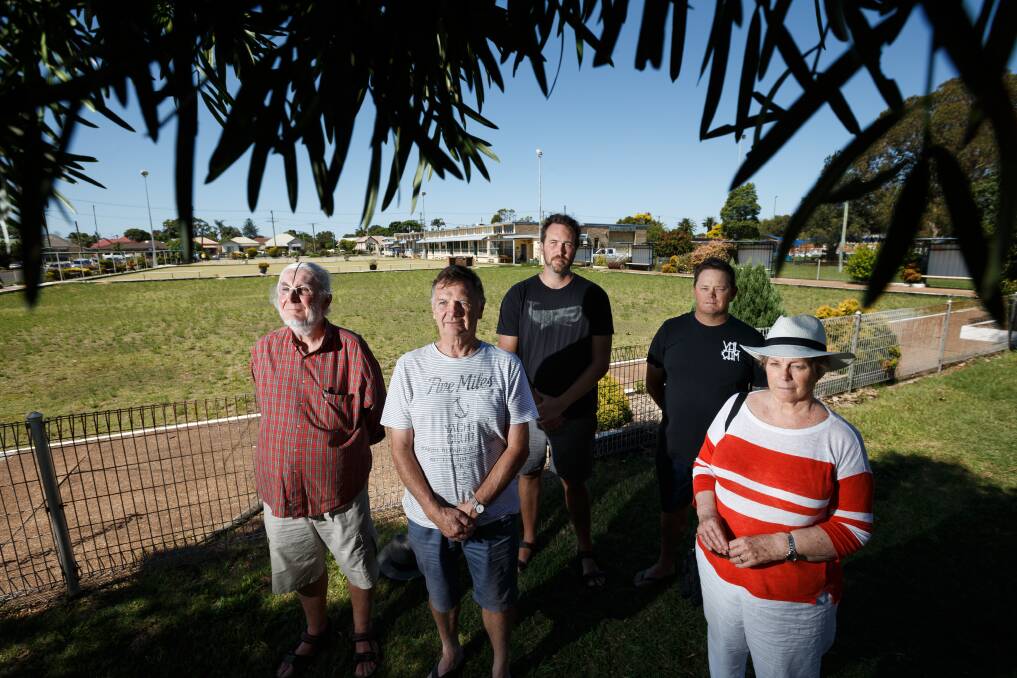 STAUNCH: A group of residents at the bowling club in Mayfield. They say the site should be reserved for public recreation. Picture: Max Mason-Hubers 