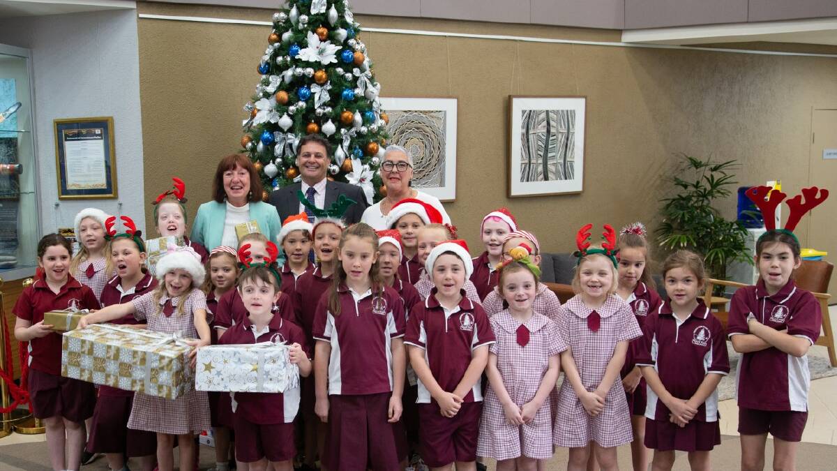 SPREADING JOY: Speers Point Public School students helped Cr Kay Fraser and Samaritans launch the Mayor's Christmas Appeal this week. 
