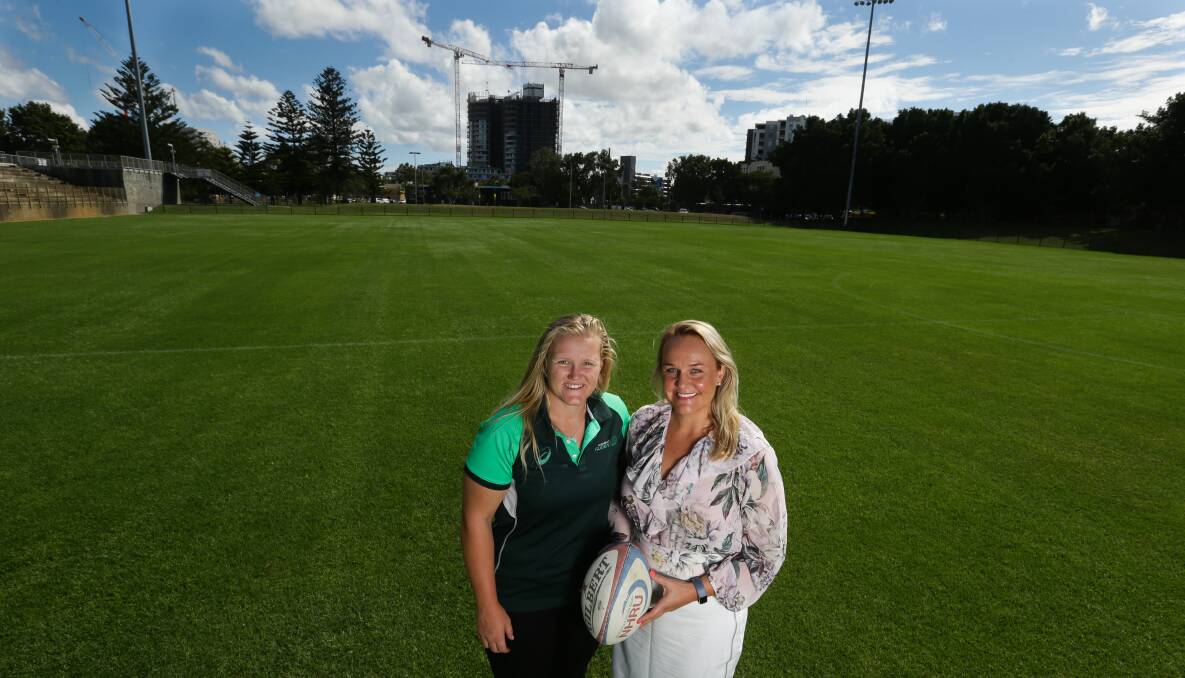 COUP: Wallaroo Emily Robinson with Newcastle Lord Mayor Nuatali Nelmes. The  women's national rugby union team will play Japan at No.2 Sportsground in July.