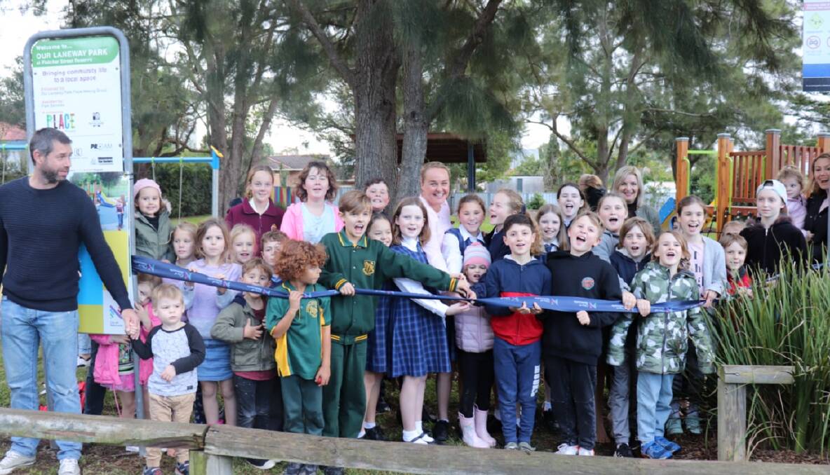 HAPPY DAYS: The opening of Fletcher Street Reserve's playground drew a large crowd. 