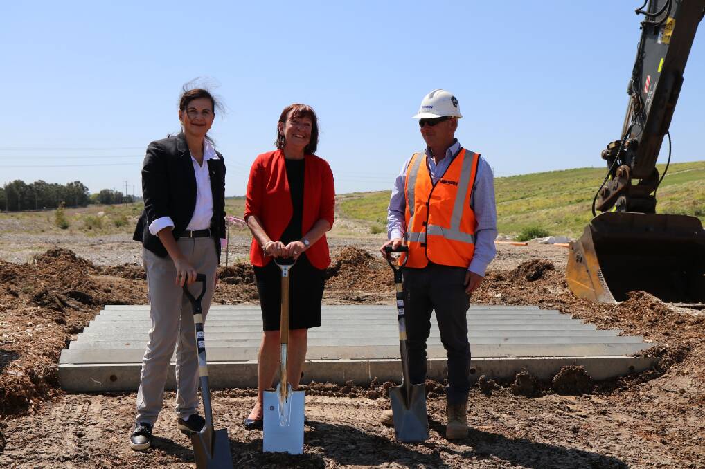 BEGINNINGS: Turning the first sod on official start of construction on the Munibung Road extension project.