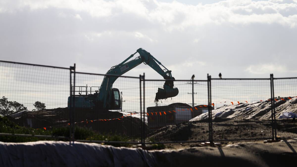 Hot zone: An excavator removing waste from the former Stockton tip site. More than 8000 tonnes of waste have been transport to the the Summerhill waste disposal centre. 