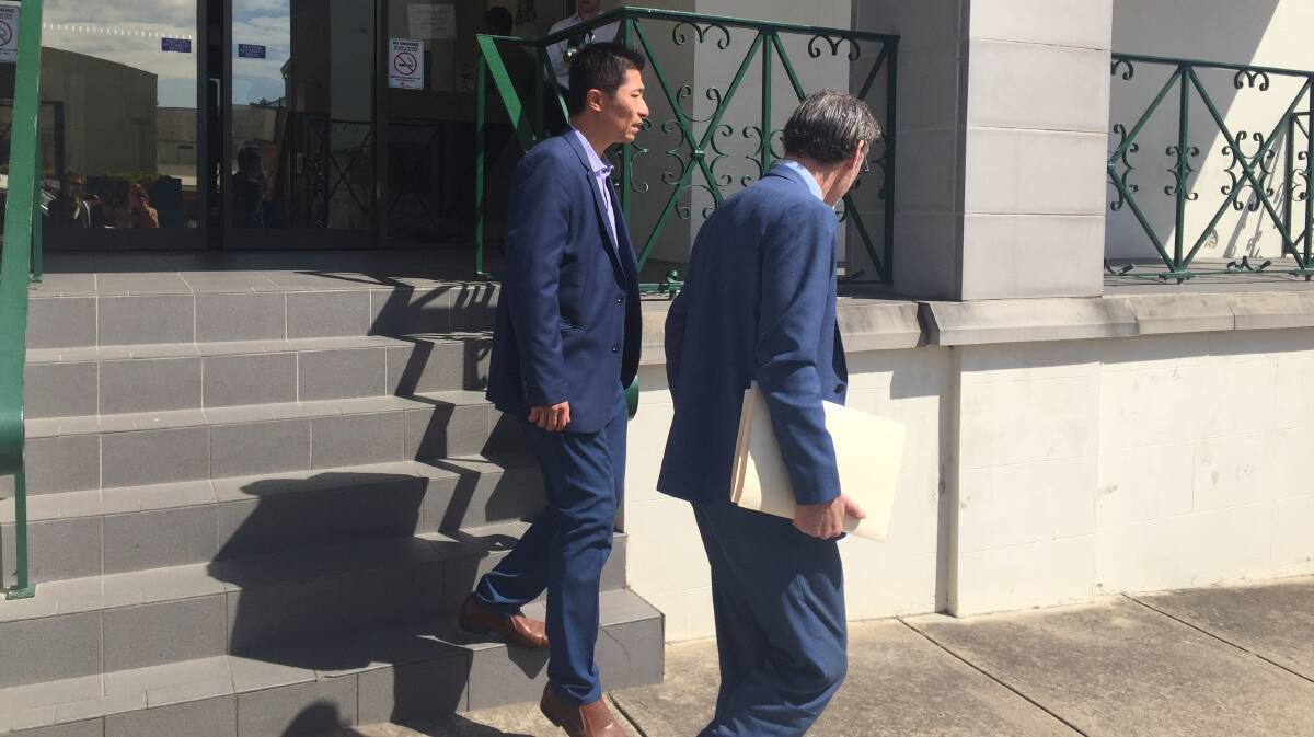 Nunawading man David Chen (left) leaves Bega Local Court after being sentenced on Tuesday, October 15. Picture: Alasdair McDonald 