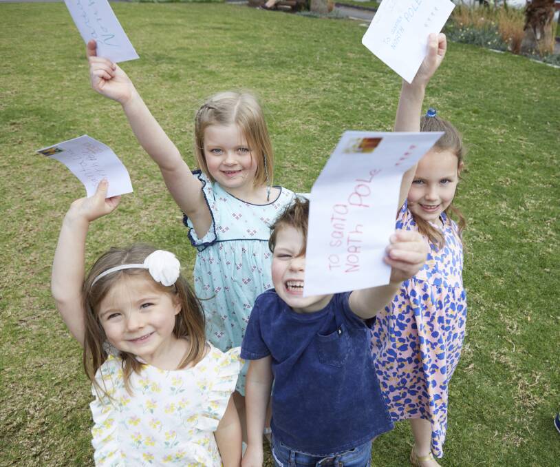 WISH LIST: Children can send letters to Santa, North Pole, 9999, with a 65-cent Christmas stamp. Free Santa Mail postcards are also available. Picture: Supplied