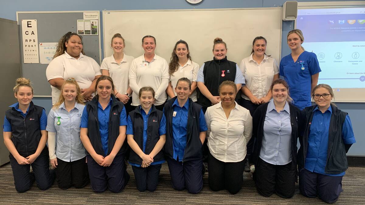 EARNING, LEARNING: Brianna Carrall, second from the right in the top row, with fellow participants in the school-based traineeship program. Picture: Supplied