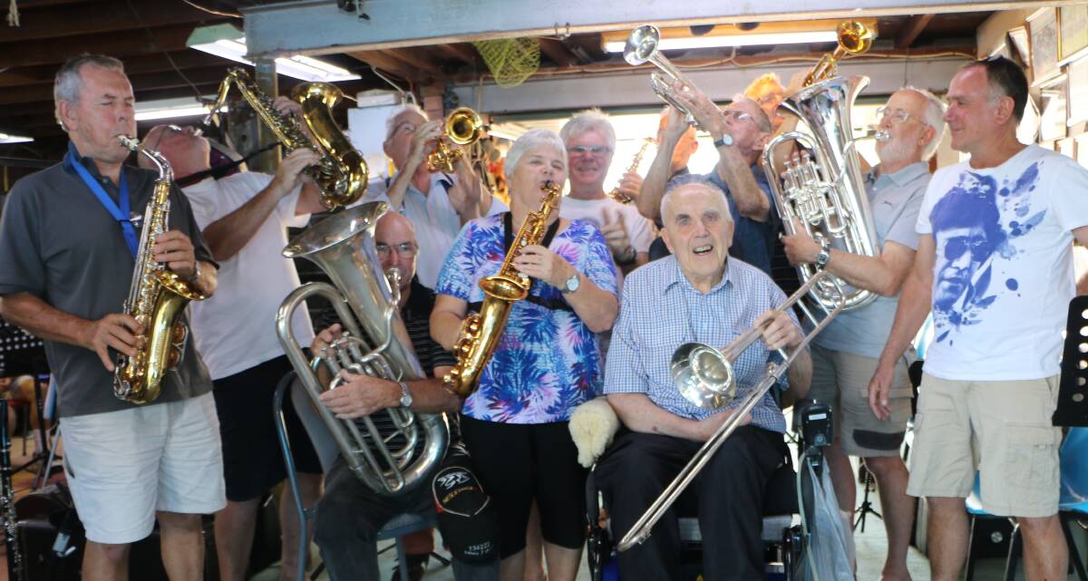 HIGH NOTE: Terry Larkin, seated right, with his colleagues from the Blackalls Swing Band, at their practice session this week. Mr Larkin's face lights up when he is reunited with the band. Picture: David Stewart