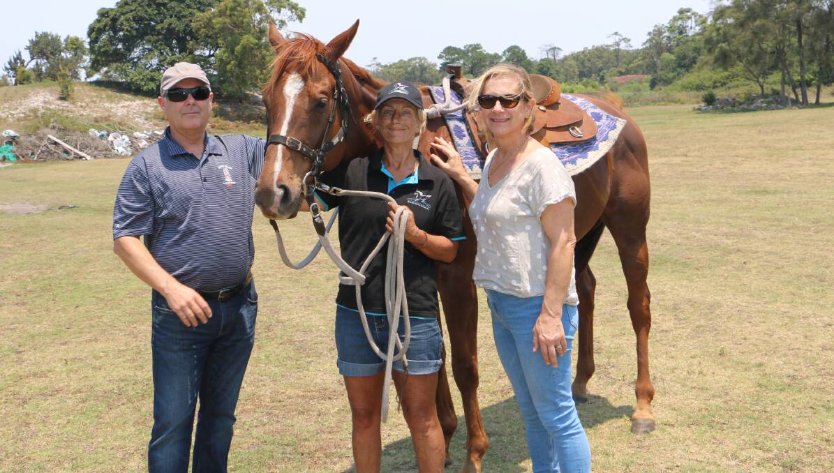CALL FOR REGISTER: Debbie Barber (centre) with former racehorse Whitestone now in her care, has joined forces with Mark and Juliana Waugh in support of a horse register.