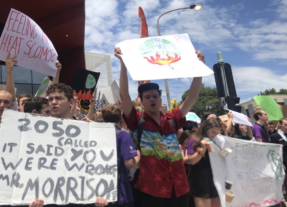 YOUNG VOICES: School students skip school to protest in Hunter Street about government policy on climate change. Pic: Melinda McMillan