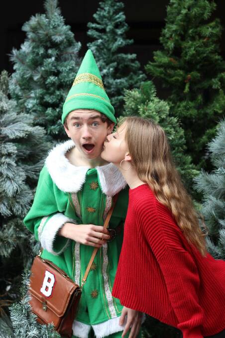 BRINGING JOY: Samuel Brien, as Buddy the Elf, with Zoe Shaw, as Jovie, star in the Young People's Theatre production. Picture: Chelsea Willis