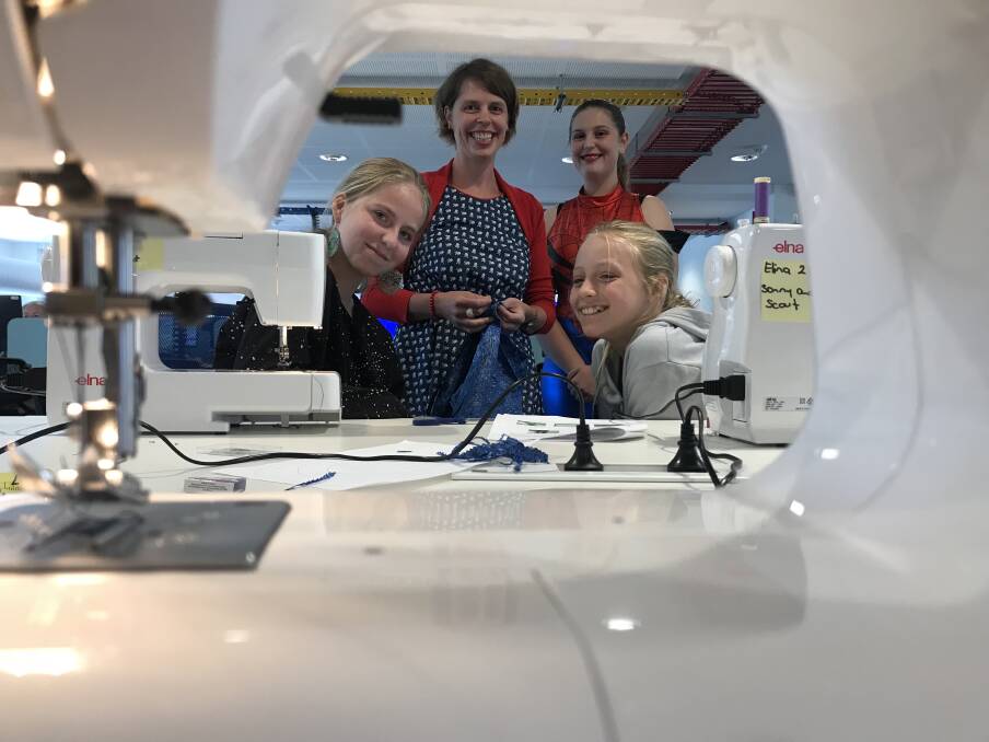 IN STITCHES: Xanthe Lamont, Lucy Merchant, Tara Johnston and Keziah Lamont at a sewing workshop held in the library's new Maker Space. Picture: Melinda McMillan