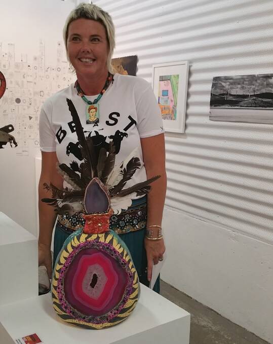 VISUAL IMPACT: Artist Natalie Duncan with her work Kimmy K Artamidae which took out the 2017 Emerging Artist Prize. 
