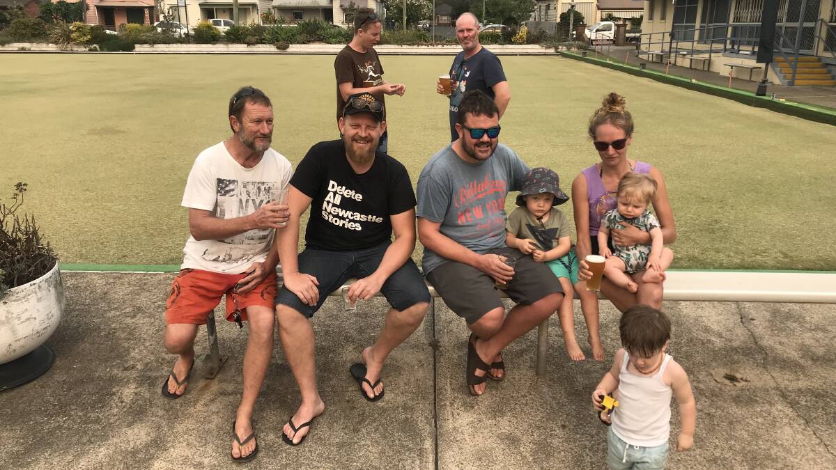 FAMILY FRIENDLY: Mayfield locals enjoy a beer on the green on a hot summer afternoon while the kids play on the greens. 