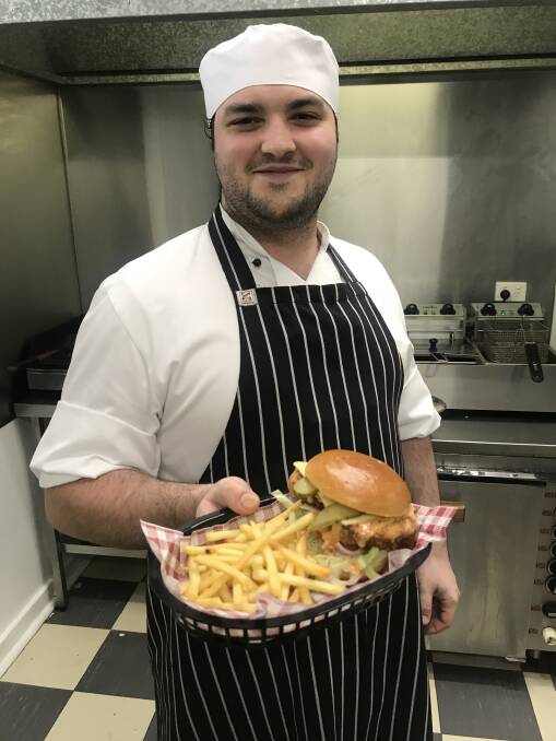 PLATE UP: Chef Beau Manzi dishes up one of the family friendly meals on the new menu at the re-opened Mayfield Bowling Club. 