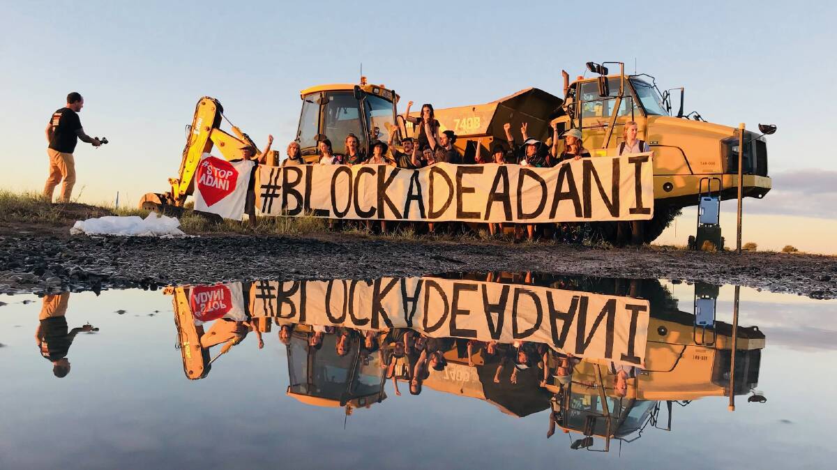 DIRECT ACTION: Protesters have blockaded a rail work site in Northern Queensland in objection to the Adani-owned Carmichael coal mine. 