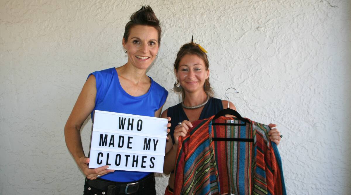 ECO-CHIC: ​Fashion Designer Rose Martinelli (right) from Santa Fe Gypsy shows Rachel Prest her Kesmek tribal jacket.
