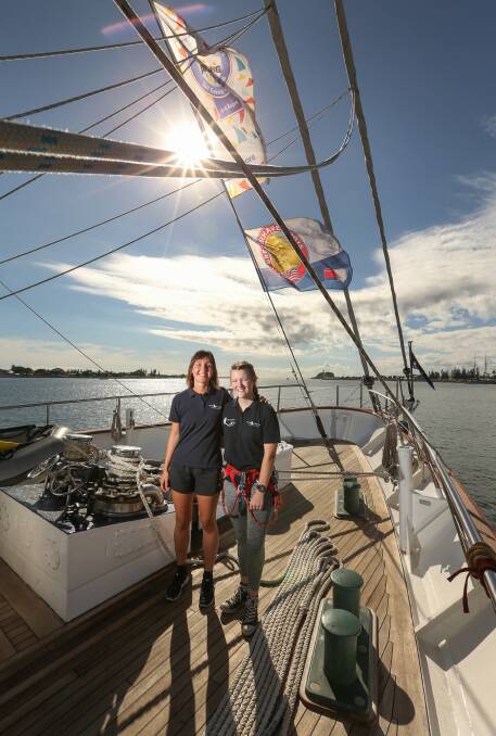 TRIP OF A LIFETIME: Anna Gibson, of Mayfield, and Avena Munro, of Adamstown Heights, on the Young Endeavour after 10 days at sea. Picture: Marina Neil 