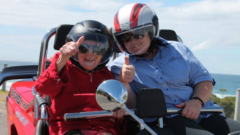 LOVE OF SPEED: Bette Bailey, 99, with her carer Amy Bland on the ride of a lifetime on the back of the German made Boom Mustang trike, 1600cc. Picture: supplied