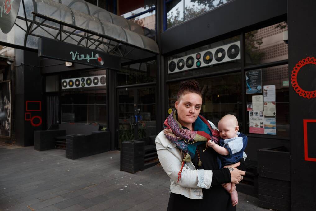 'PETRIFIED': Newcastle cafe Vinyl owner Fiona Richards, pictured with her daughter Harper, said the business had to close. Picture: Max Mason-Hubers 