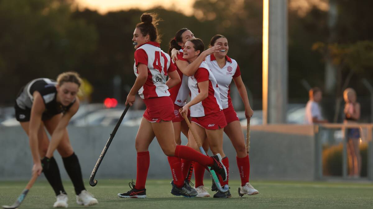 Oxfords celebrate a goal during last year's grand final at Newcastle International Hockey Centre. Picture by Marina Neil