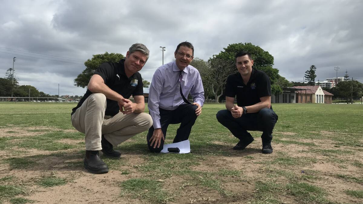 UPGRADE: Parliamentary Secretary for the Hunter Scot MacDonald (centre) at National Park Sportsground with Cooks Hill United Football Club committee member David Morley (left) and club facilities manager Lee Bateman (right). Picture: Supplied