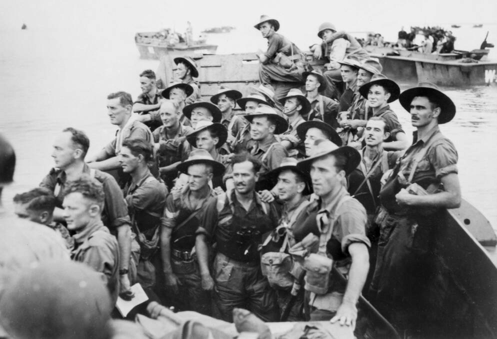 HEAVY LOSSES: Australian troops landing on Tarakan. Picture courtesy Australian War Memorial.