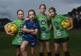 Young Jets supporters Stella Lowe, Mia Tucker, Eden Andoni and Airlie Sullivan at the Lake Macquarie Regional Football Facility. Picture by Marina Neil 