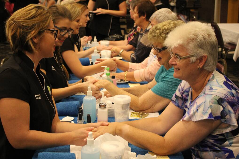 TREATED: Volunteers give their time and services for a worthy cause during Bald and Beautiful Day, where cancer patients get to be pampered, indulged and entertained.