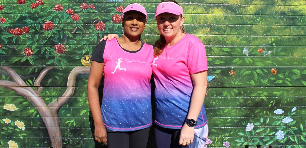 ENCOURAGING: Sanji Johnson, left, has discovered a love for running through the Night Striders, which was co-founded by Darlene Reis, right.