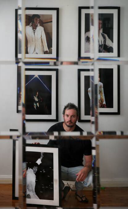 SHOPPIN' AROUND: Adam Nicholson with original framed photographs of Elvis on tour. Nicholson will release a selection of pictures for the Garage Sale Trail. Picture: Marina Neil