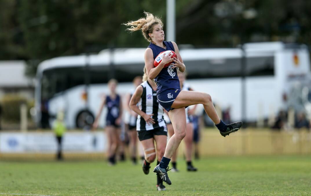 STAYING LOCAL: AFLW player Sarah Halvorsen will again take the field for defending champions Newcastle City in an abbreviated competition starting July 18. Picture: Marina Neil