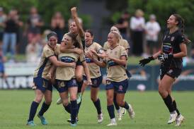 Jets striker Melina Ayres celebrates after scoring a double to seal an important Jets win against Melbourne Victory at No.2 Sportsground on Saturday. Picture Getty