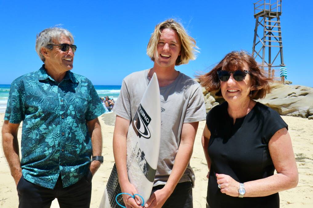 WILDCARD: Warren Smith and Cr Kay Fraser with Redhead local Connor Lee.