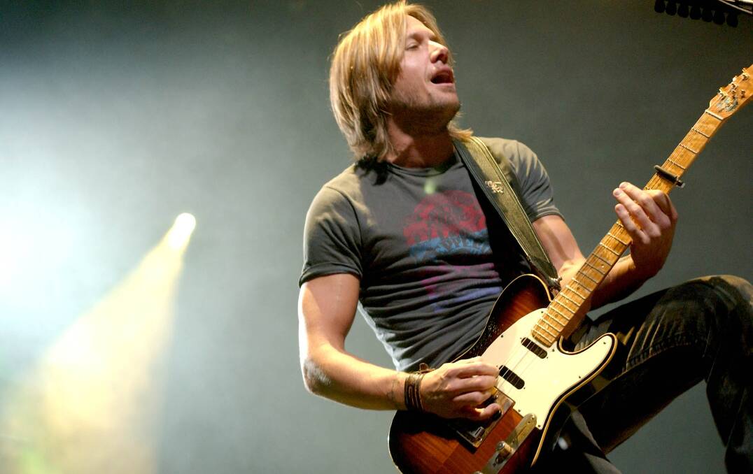 ROCKING ON: Australian country rocker Keith Urban will hit the stage at Newcastle Entertainment Centre on Wednesday, supported by Julia Michaels. Picture: Jesse Marlow