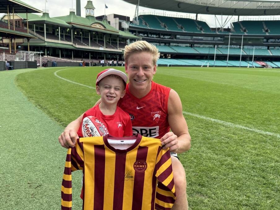 Sydney Swans star Isaac Heeney with Cameron Park boy Jordan Bradshaw at the SCG this week. Picture supplied