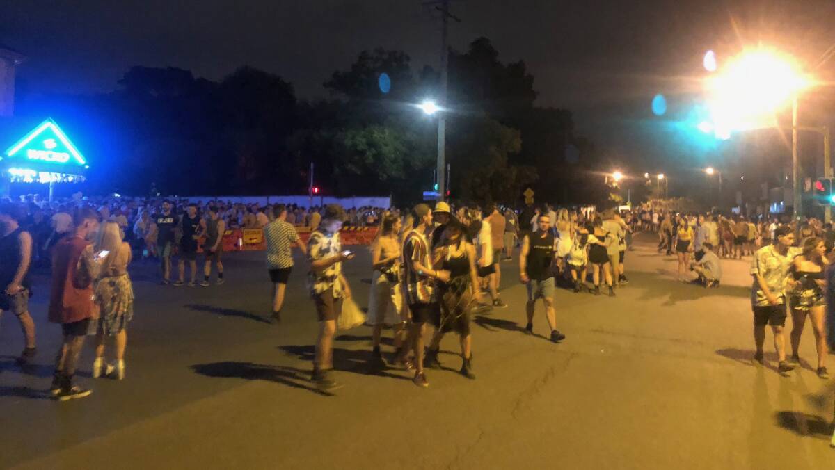 The corner of Albert Street and the Pacific Highway as hundreds of festival-goers crowd toward Beaumont Street as This That 2018 winds up.