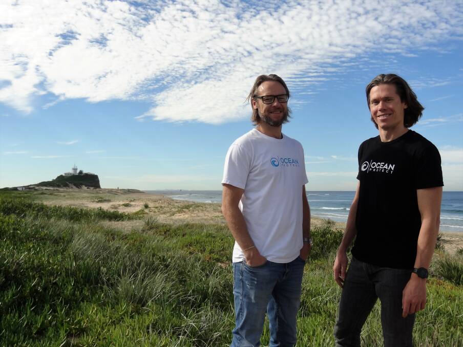 Jeremy Brown and Brad Dalrymple from Ocean Protect at Nobby's Beach on June 12. Pictures: Ellie-Marie Watts