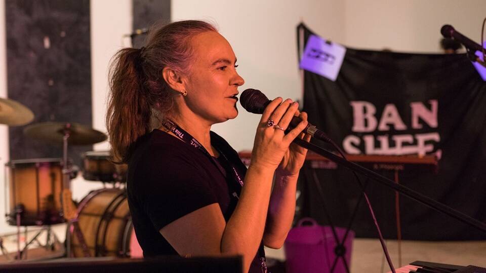 CREATIVE: This is Not Art festival director Christina Robberds speaking at TiNA Takeover in 2018. The 2019 program is now live at thisisnotart.org. Picture: One Stop Productions