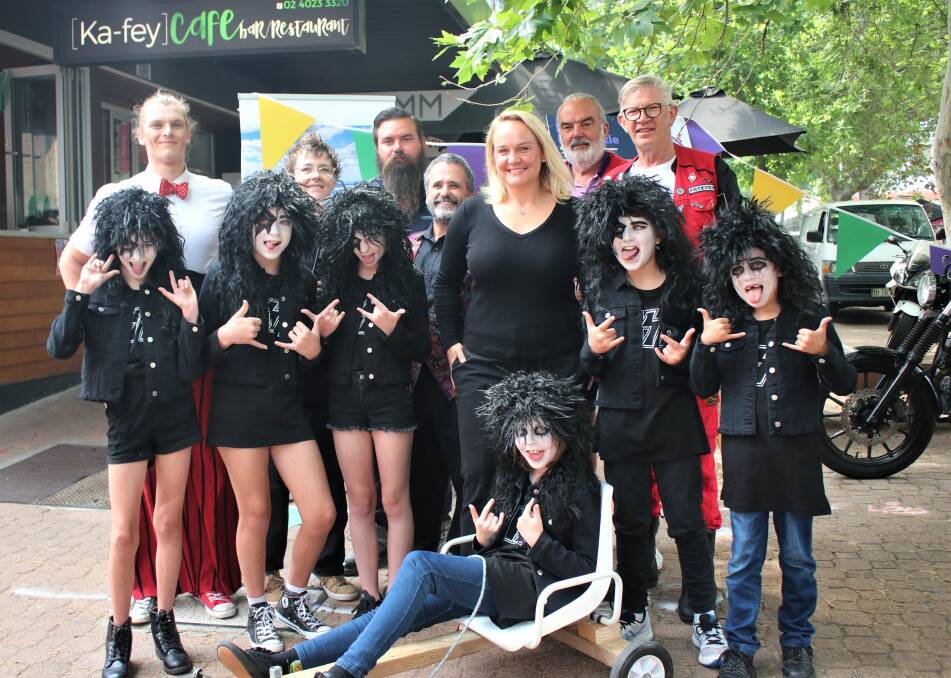 RACE WEEKEND: Newcastle Lord Mayor Nuatali Nelmes with Ka-fey Cafe owner Lucy Glover, Circus Avalon, young KISS impersonators and Santa Toy Run participants in Hunter Street Mall at the launch of the Enjoy Newcastle program on October 30.