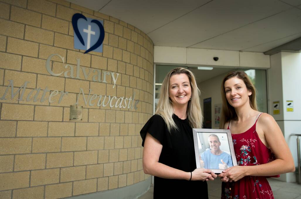 LOVING: Peter Cameron's daughters, Megan Baird and Lisa Eaton, at the Calvary Mater Hospital. Picture: Marina Neil