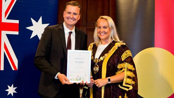 Mark Hughes receiving his 2018 Citizen of the Year award from Newcastle Lord Mayor Nuatali Nelmes.