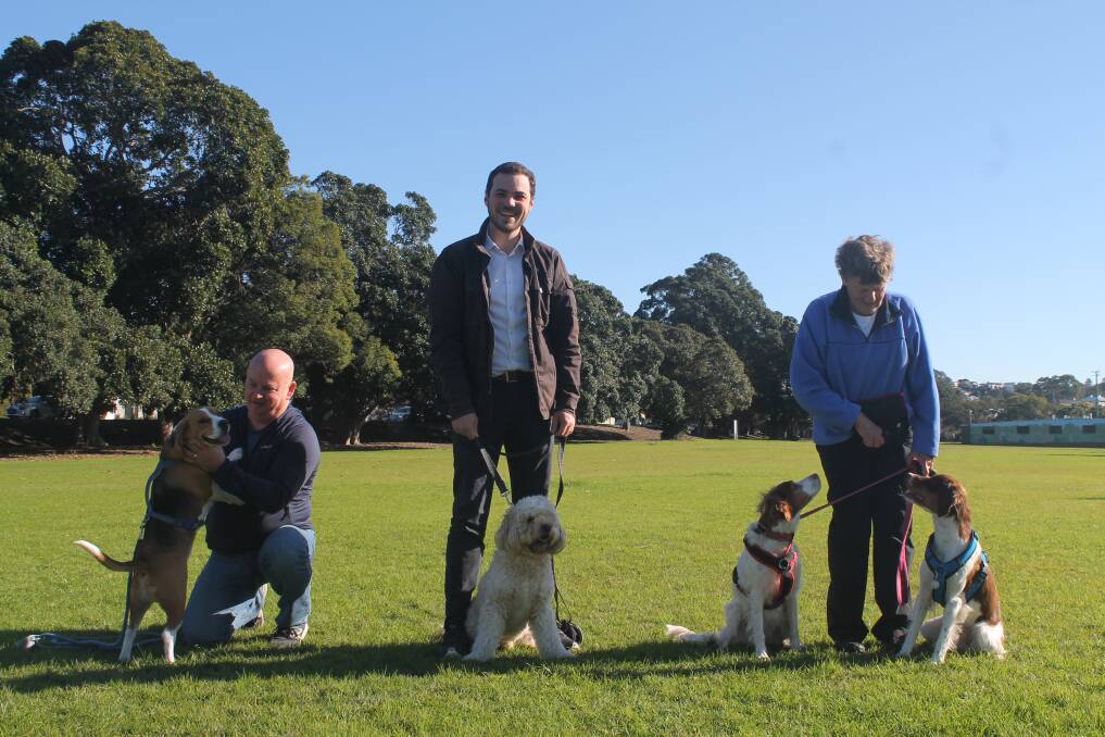 NEW DOG PARK: Lambton resident Mark Brooker with dog Wesley, Newcastle Deputy Lord Mayor Declan Clausen with Toby and Lambton Residents Group member Mary Webster with Jem and Scout at Lambton Park. Picture: Supplied