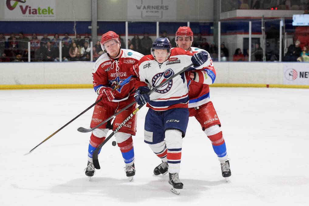 Hamish Powell and Dave Ferrari get physical with Perth Thunder. Picture: PowerPlay Photographics