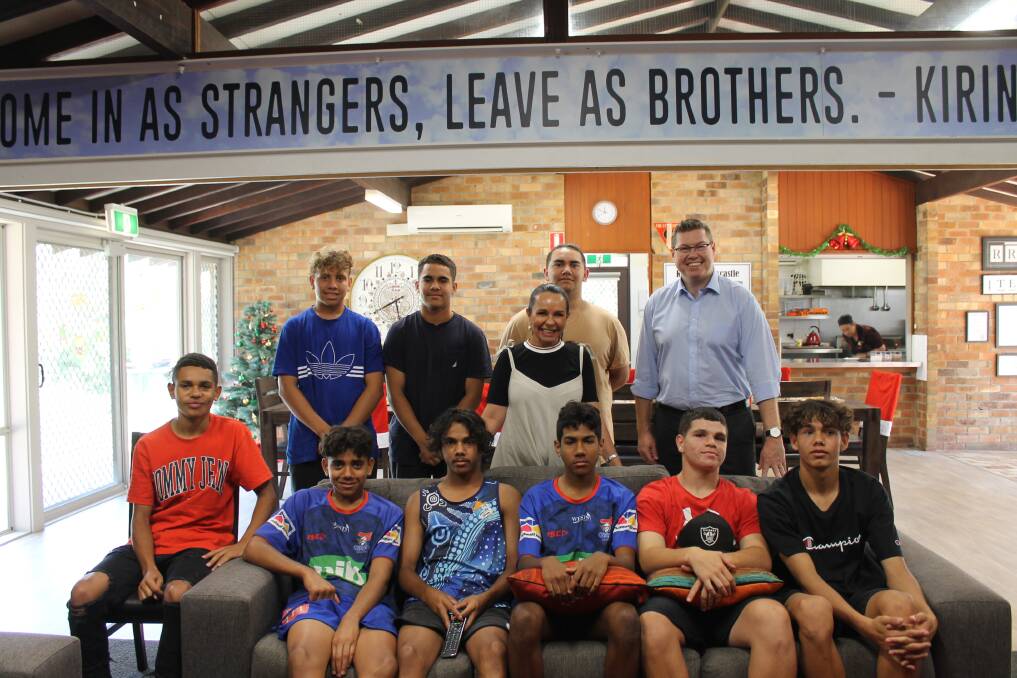 INSPIRATIONAL: Federal MPs Linda Burney and Pat Conroy, back far right, with young Indigenous men who live at Kirinari Hostel in Garden Suburb.