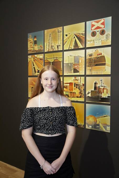 Elyssa Whittaker in front of her work titled NEWCASTLE, now showing as part of ArtExpress at the Art Gallery of NSW. Picture: Mim Stirling
