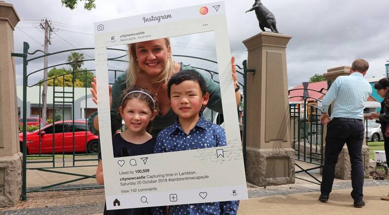 Lord Mayor Nuatali Nelmes with Elder Street Early Childhood Centre students Lucas Wang, 5, and Mia Witherdin, 4.