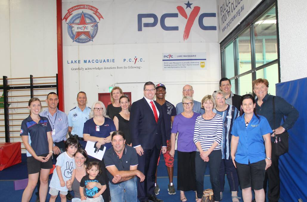 PLEASED: Shortland MP Pat Conroy, centre, with Lake Macquarie PCYC members, staff and official representatives at the opening of the club's refurbished gymnastics space. Picture: Supplied